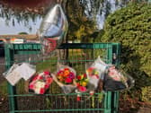 Floral tributes at The Willows for Mrs Booth