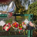 Floral tributes at The Willows for Mrs Booth