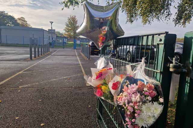 Floral tributes at The Willows for Mrs Booth