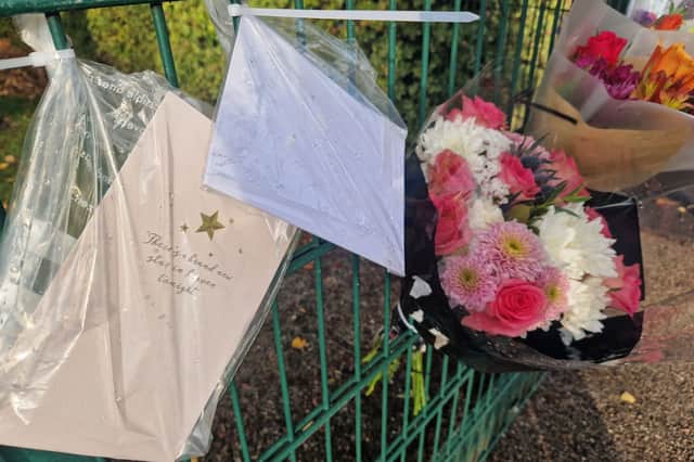 Floral tributes at The Willows for Mrs Booth