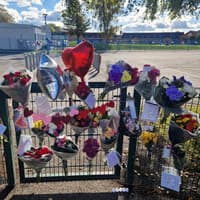 Tributes at school for beloved headteacher