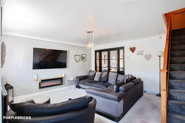 The orangery extends the home's living space, offering a bright setting for relaxing or entertaining