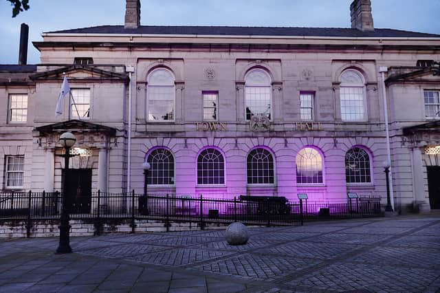 Rotherham Town Hall lit up purple in support of Domestic Abuse Awareness Month