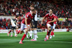 Aaron Drinan scores a goal for Swindon Town who are Rotherham United's next opponents