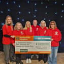 (L-R) Jamie Mitchell from Rotherham Hospice, Abbie Parkin from Wickerlsey Club, Dawn and Carl Lucock, Paws to Hooves' Diane Blackham and Debbie Houghton from Barnardo's 