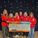 (L-R) Jamie Mitchell from Rotherham Hospice, Abbie Parkin from Wickerlsey Club, Dawn and Carl Lucock, Paws to Hooves' Diane Blackham and Debbie Houghton from Barnardo's 