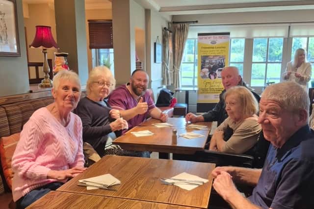 Guests enjoying the event from Broom Lane Care Home