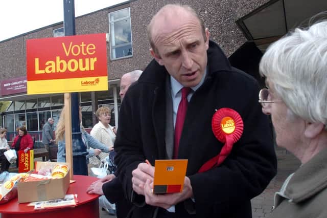 MP John Heeley speaks to members of the public in the centre of Wath on Dearne
