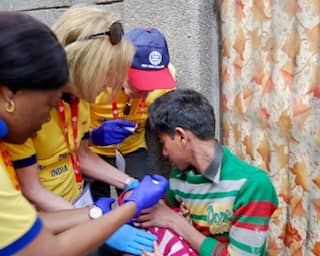 Rotherham Rotary Club volunteers help administer the vaccination in India in 2018 