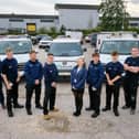 (L-R) Equans project director, Neil Wright,  with apprentices Carter, Shae, Liam, Gracie, Stephen, Konner, and Alex, and Rotherham Council head of housing property services, Lynsey Stephenson