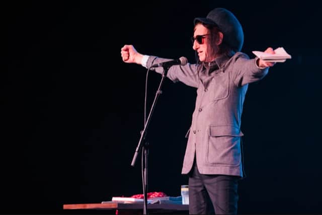 Dr John Cooper Clarke