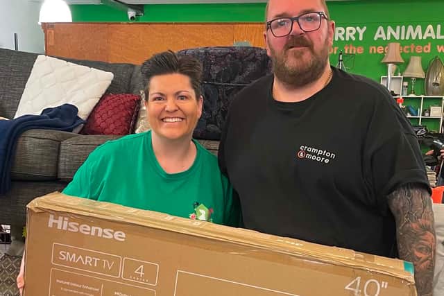 Thornberry Animal Sanctuary Rotherham shop manager Emma and Crampton & Moore delivery man Dave.