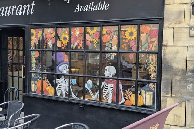 The Minster View cafe has a delicately painted window featuring skeletons and witches