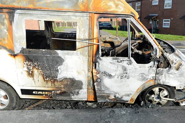 Burnt-out camper van outside Mrs Fitzpatrick's Whiston home