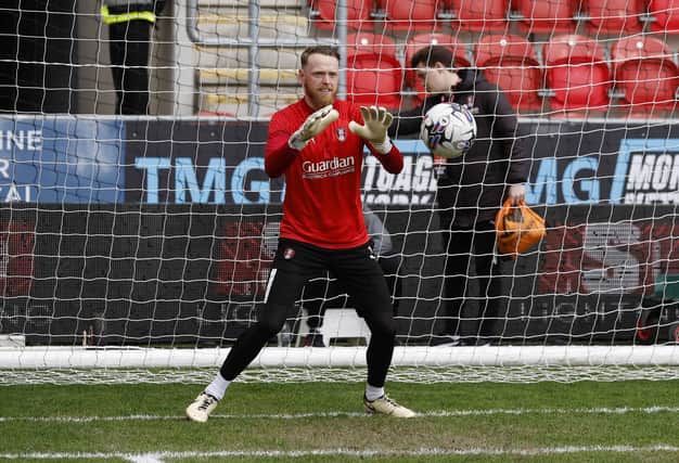 Viktor Johansson warms up before the Cardiff City game but there would be no start for the Rotherham United goalkeeper. Picture: Jim Brailsford