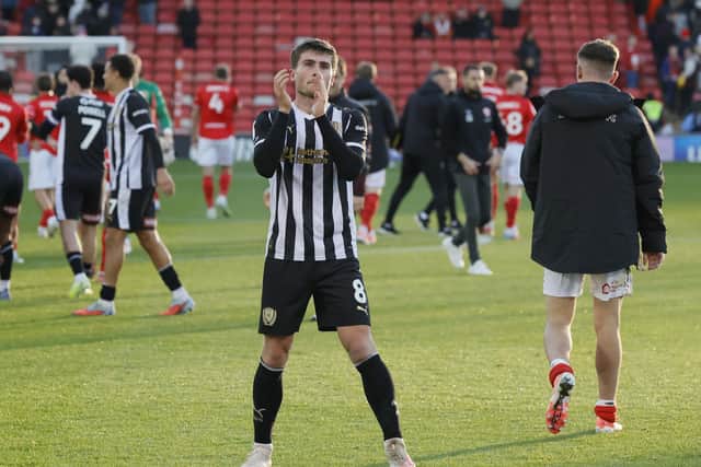 Match-winner Kian Spence applauds the Rotherham United fans after the victory at Barnsley. Picture: Jim Brailsford