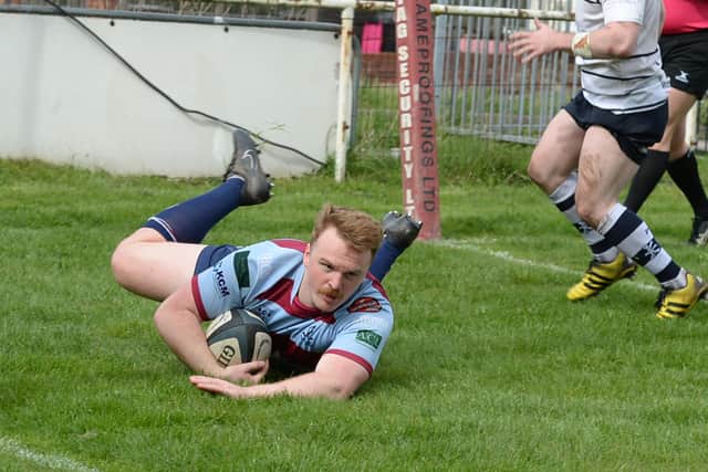 Jack Townend claims one of his two tries.