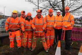 Leader Cllr Chris Read (right) with RMBC staff working on a neighbourhood improvement project