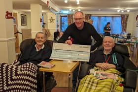 Rob presented the home with a cheque following the conclusion of the challenge - he is pictured with residents Colin Picken and Eddie Henshaw