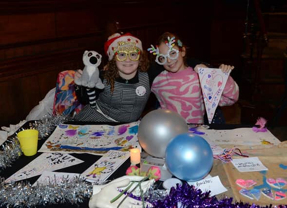 Isabelle Moore (left) and Joss Stephenson with their Lemur Day and Best Friends Day stalls at the Unique Stalls of Celebration event at Grimm & Co - pic by Kerrie Beddows