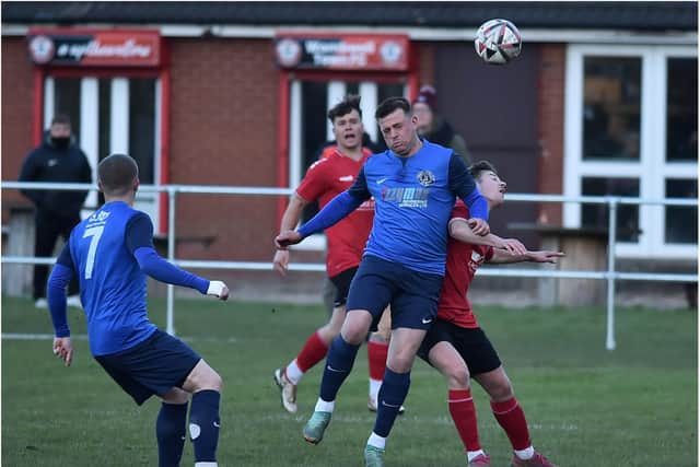 Parkgate and Wombwell Town fight it out.