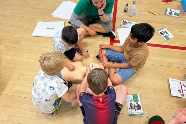 Boy Lesson Spring First Aid 240 children receive life-saving first aid training this summer