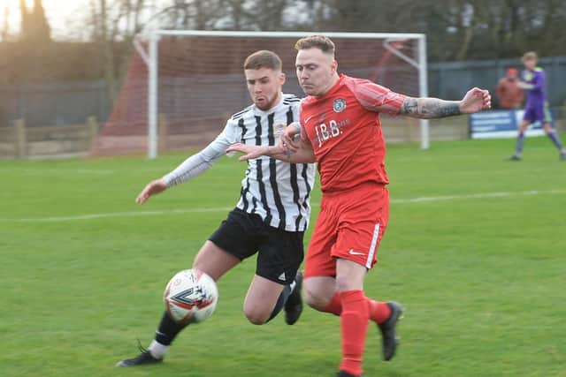 Parkgate's Niall Smith in action against Athersley Rec.