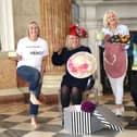 Fundraising manager Carole Foster, who will be doing a fire-walk, with hat designer Sherry Richardson, PR consultant Jo Davison and glass artist Pam Goodison