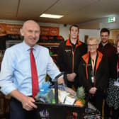 John Healey MP with councillor for Dearne South Abi Moore (second right) and store manager Mark Howorth.  Photo by Kerrie Beddows