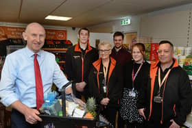 John Healey MP with councillor for Dearne South Abi Moore (second right) and store manager Mark Howorth.  Photo by Kerrie Beddows