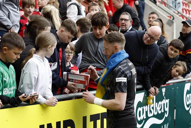 Viktor Johansson mingles with Rotherham United fans after the Cardiff City game. Picture: Jim Brailsford