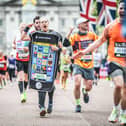 Karen Stebel takes part in the London Marathon in her phone costume