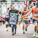 Karen Stebel takes part in the London Marathon in her phone costume