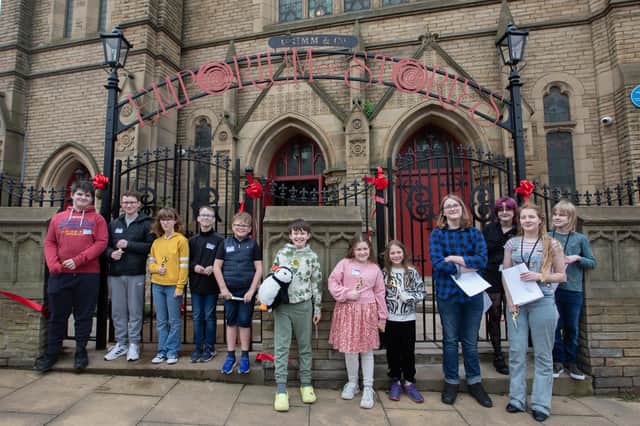 Young people cut the ribbon at Grimm & Co's official opening - photo by Andy Brown