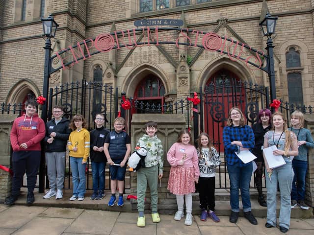 Young people cut the ribbon at Grimm & Co's official opening - photo by Andy Brown