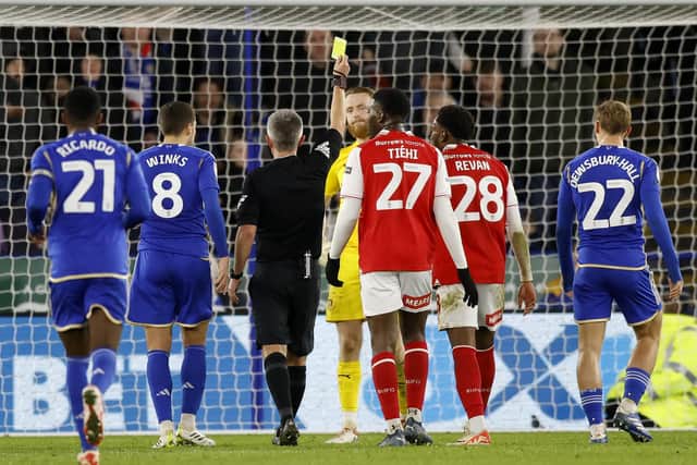 Rotherham United goalkeeper Viktor Johansson is booked after bringing down Patson Daka and giving away a penalty at Leicester City. Picture: Jim Brailsford