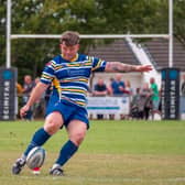 Table-toppers: Jonny West kicks for goal for Dinnington, who face Wath next. Picture by Chris Harrison