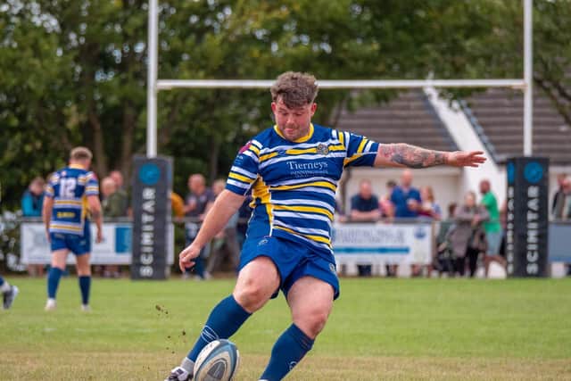 Table-toppers: Jonny West kicks for goal for Dinnington, who face Wath next. Picture by Chris Harrison
