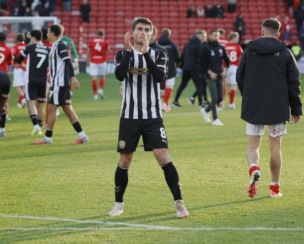 Happy scenes at Oakwell as Rotherham United match-winner Kian Spence applauds travelling fans after the victory over Barnsley in October.