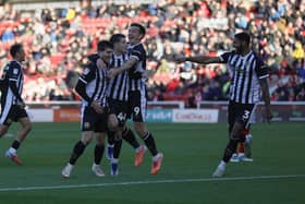 Rotherham United celebrate their winning goal at Barnsley. Picture: Jim Brailsford