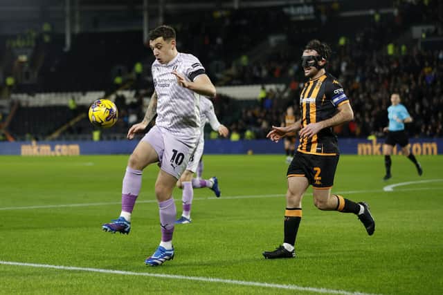 Jordan Hugill in possession for Rotherham United in the Millers' Championship defeat at Hull City. Picture: Jim Brailsford