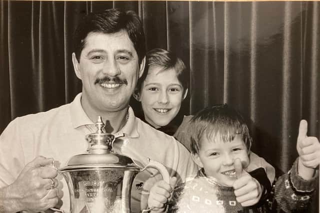 Dennis Priestley and kids Wayne and Adam after 1991 world title triumph