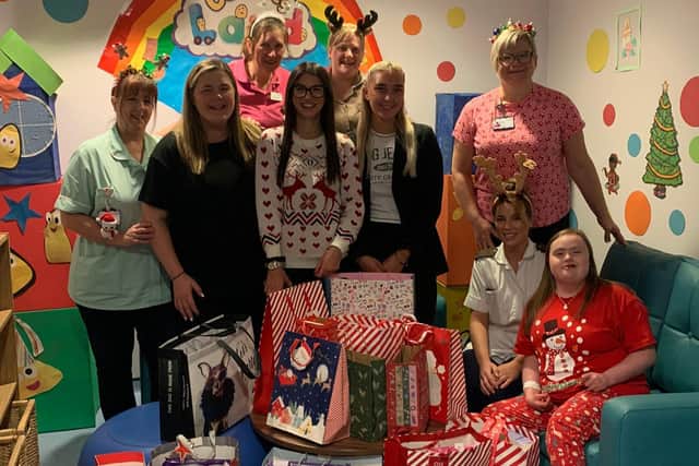 The team from William H Brown in Doncaster donate gifts to the Children’s Ward at DRI