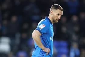 Key man: Tom Lees on the pitch for Peterborough United last term.