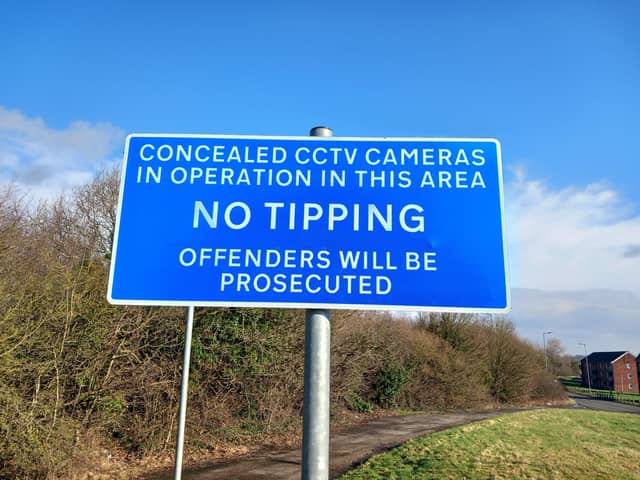 Ignored: The Advertiser found rubbish dumped within sight of this sign
