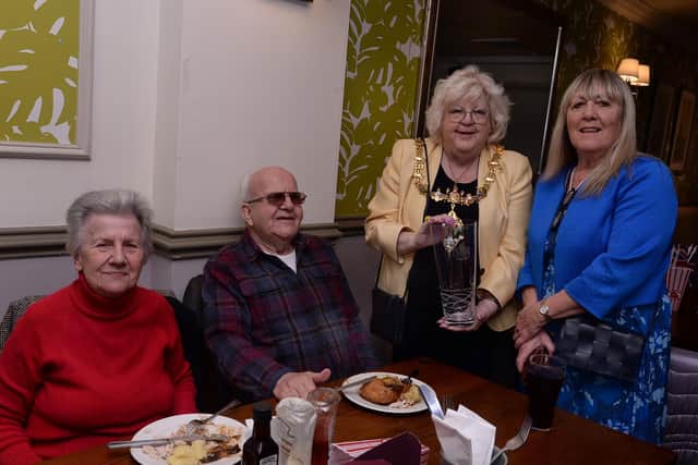 The Mayor of Rotherham dropped in at the Story Teller Friendship Lunch event, to present Ken and Sheila Charnock with a diamond wedding anniversary gift. Also pictured is Kathy Markwick who runs the group - photo by Kerrie Beddows