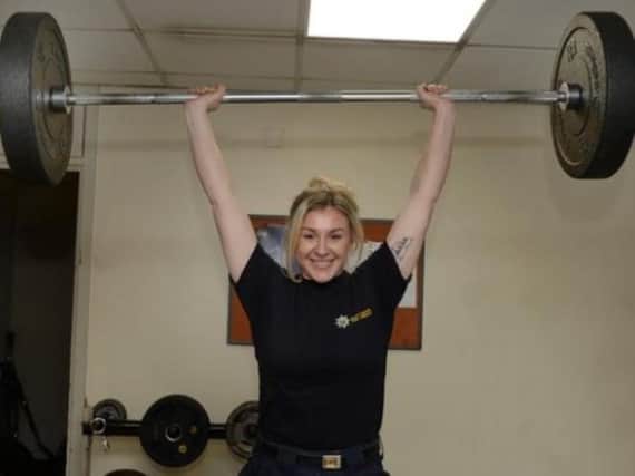Bronte works out in the SYFR gym at Rotherham Fire Station - photo by Kerrie Beddows