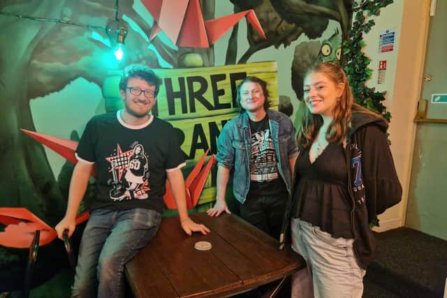 TUNE IN: Pub boss Adam with musicians  Chris and Daisy at the venue
