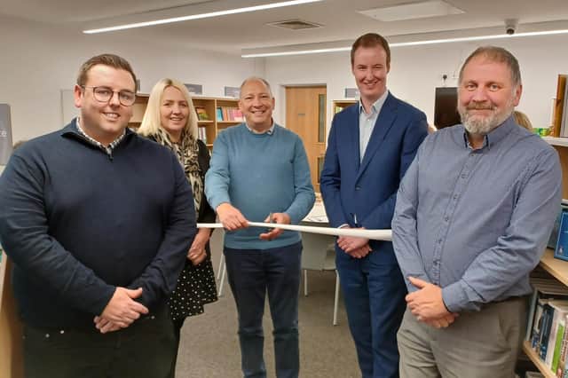 Cllr Brian Clark cuts the ribbon. Also pictured, from left: Thurcroft Parish Council clerk Tom Collingham, RMBC customer services manager Zoe Oxley, RMBC leader Cllr Chris Read and cabinet member Cllr David Sheppard