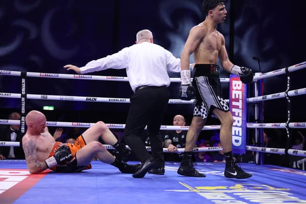 Junaid Bostan sends Jack Martin to the canvas as the referee waves off the contest. Pictures by Mark Robinson, Matchroom Boxing